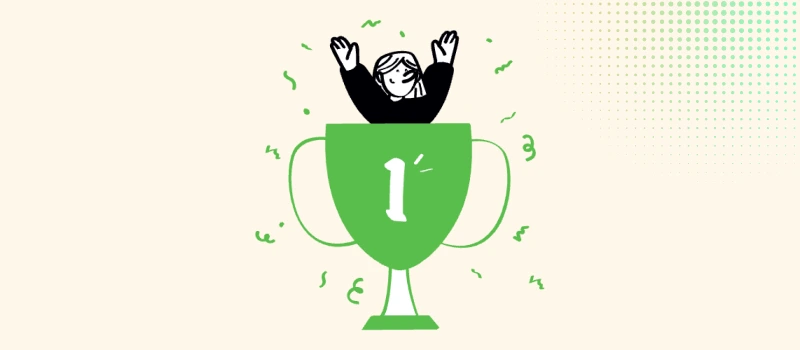 Person celebrating inside a #1 trophy cup &mdash; winning results from smart, affordable brand naming."